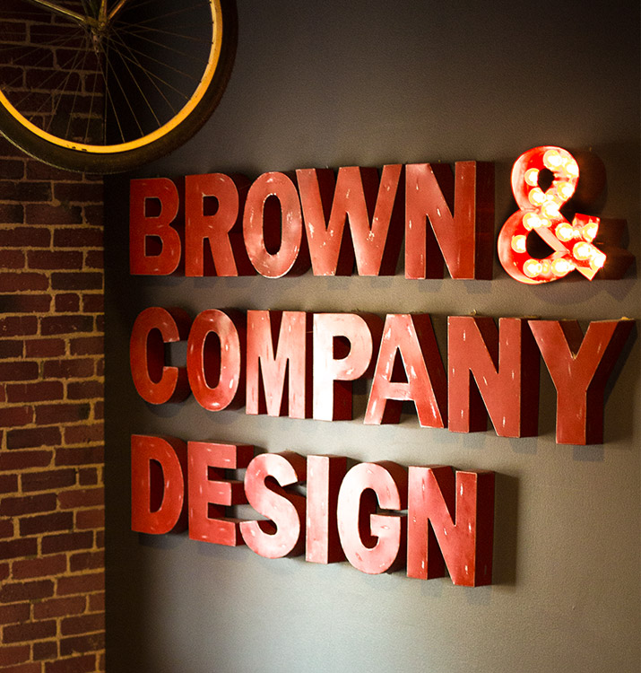 Brown & Company Design lettering on the wall of our office